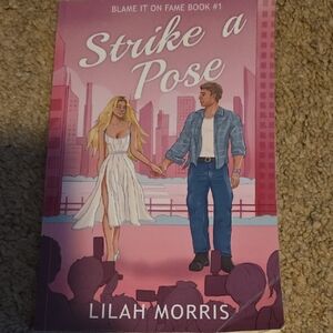 Strike a Pose by - Pink Cover Coffee Table Book